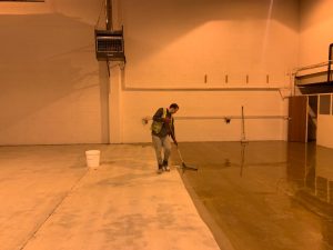 man applying resin floors